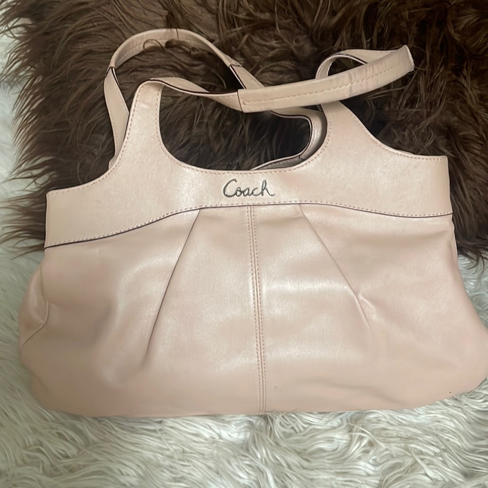 Beautiful pale pink Coach bag. Minor imperfections.
